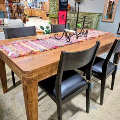 dining table with black leather chairs