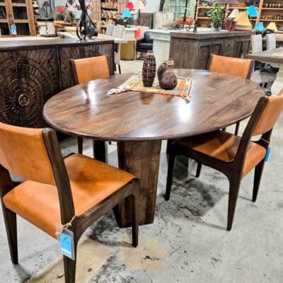 dining table with tan leather chairs