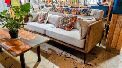 grey sofa with table and decor