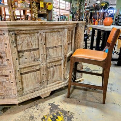 wooden bar with high chair