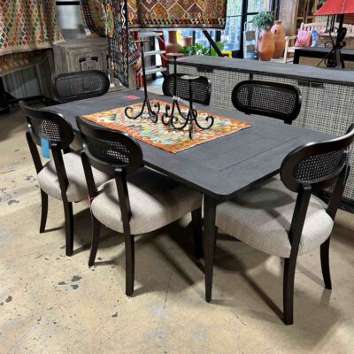 50 percent off ebony dining table and gray chairs